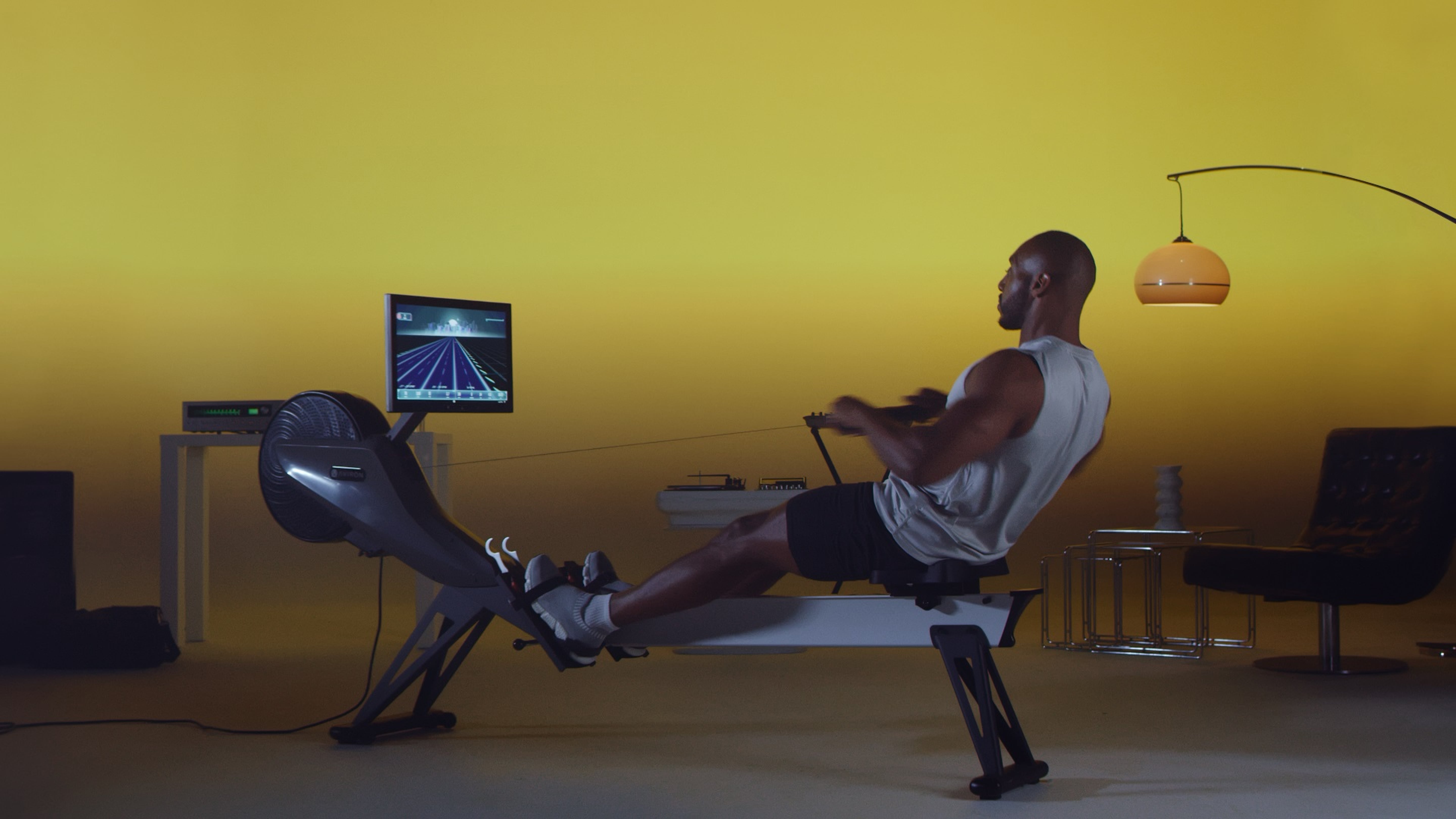 Man working out on an Aviron indoor rower